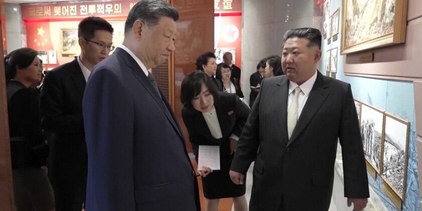 Xi & Kim pledge to carry forward China-DPRK friendship